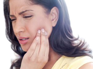 mulher com dor orofacial cronica